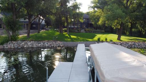 Beautiful picture of the home from the end of the dock