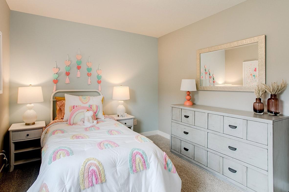 Each of the home's three upper level secondary bedrooms are also nice and spacious, and each feature walk-in closet's of their own!! (Photo of model)