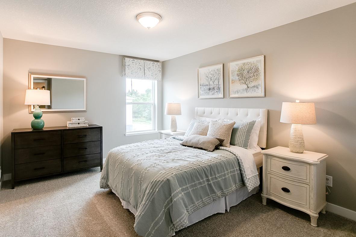 Each of the home's three upper level secondary bedrooms are also nice and spacious, and each feature walk-in closet's of their own!! (Photo of model)