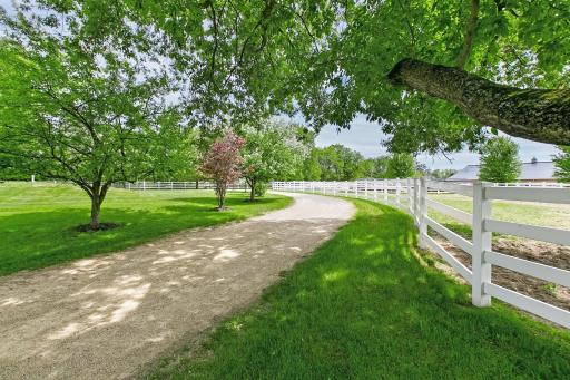 Long private driveway to residence and barn complex