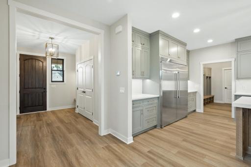 Front foyer and views of part of the kitchen