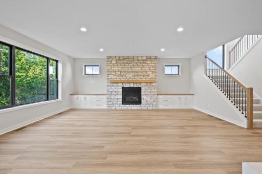 Living room with 8ft fireplace and two 8ft built-ins on either side