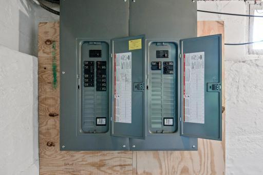 Two 100 amp electrical panels with circuit breakers!