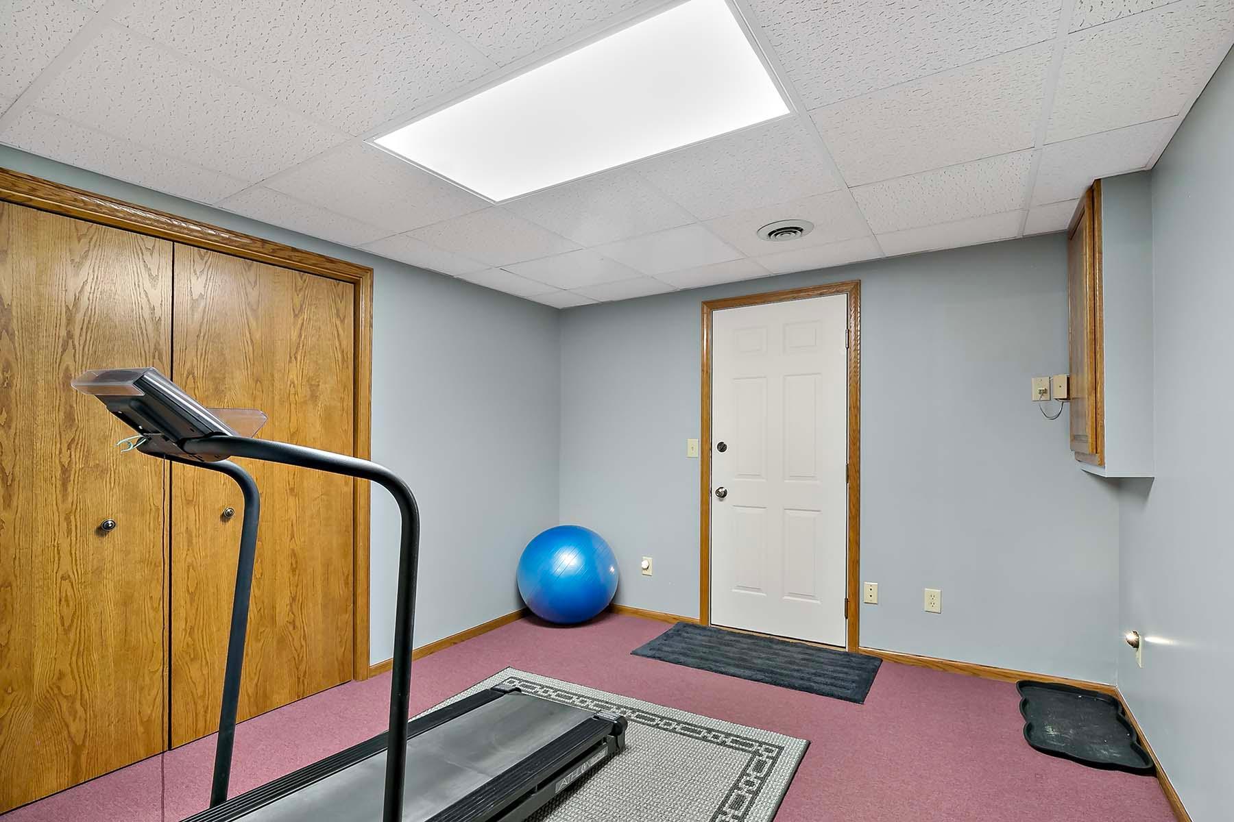 Exercise Room - lower level with door to lower 2 car garage
