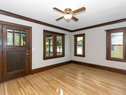 Step into your front living room. New and refinished hardwood flooring on the main level.