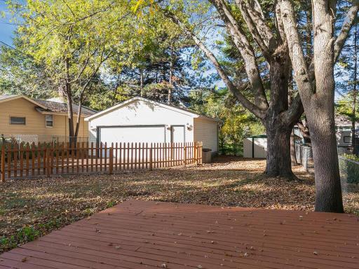 The backyard is completely fenced and offers plenty of yard space for playtime with kids and/or pets.