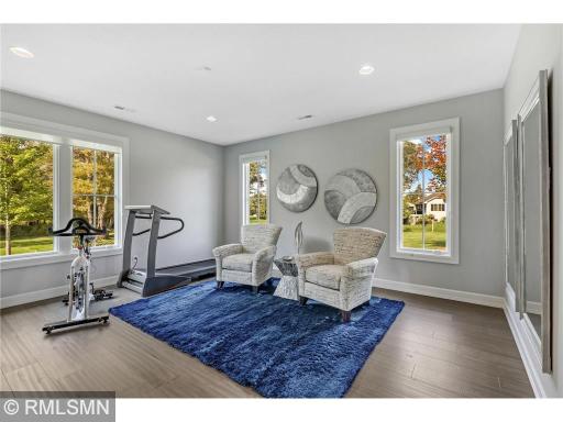 What is currently being used as an exercise room - this space is easily changed into a 2nd master bedroom. Simply bring your ideas and furniture and make it happen.