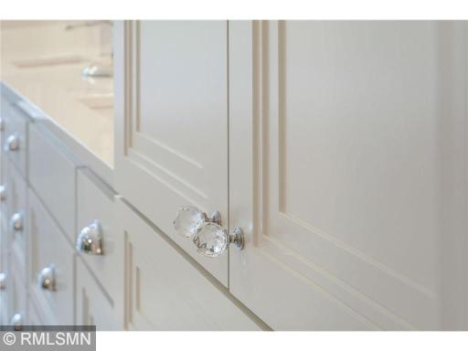 And more crystal knobs on bathroom, kitchen and laundry cabinets alike.