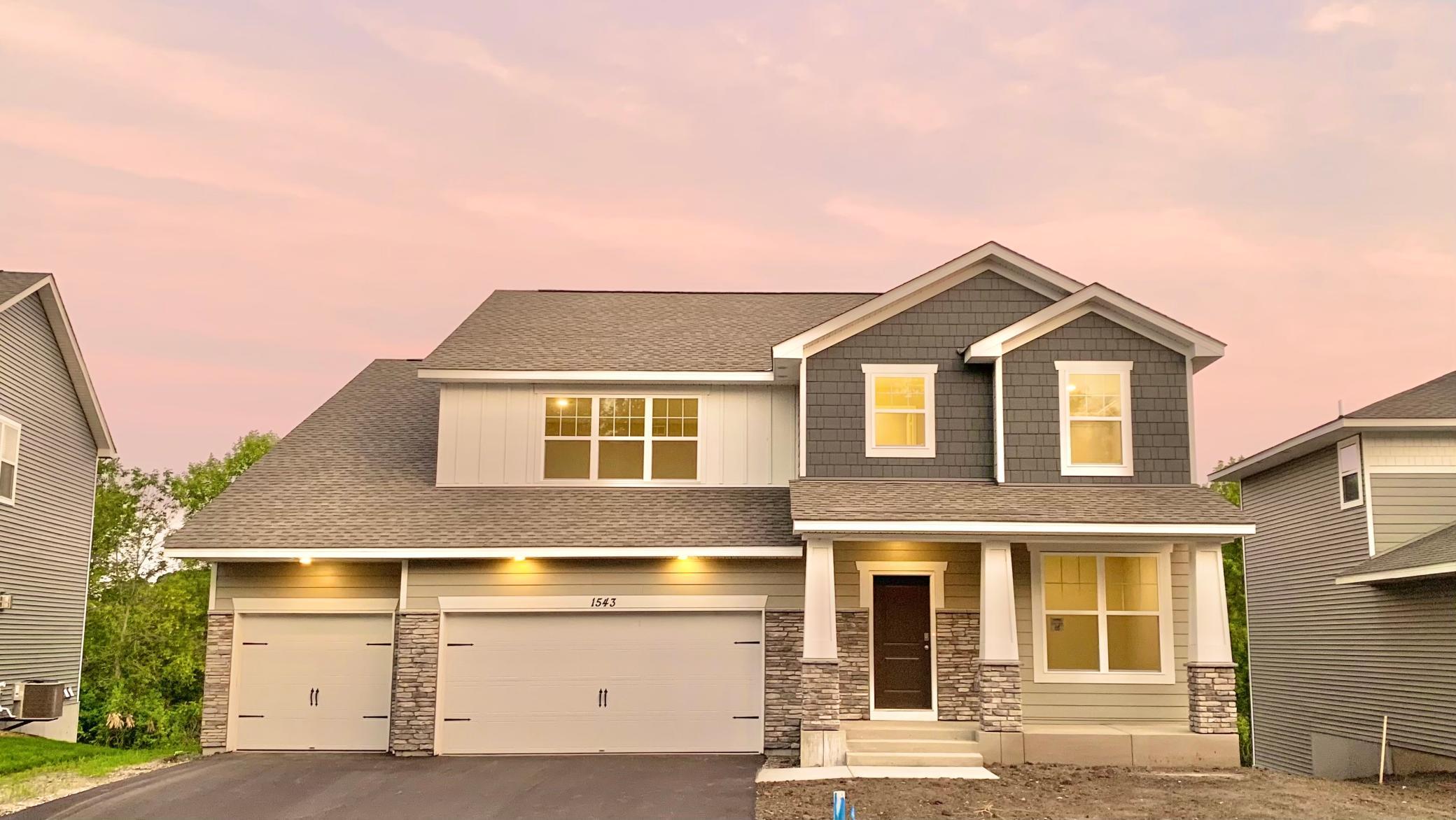 This brand new home is ready for YOU to call home sweet home! Charming front porch and soaring roof lines. Sod, irrigation and landscape included. Views of mature trees/conservation area. Walking trails, community park and more!