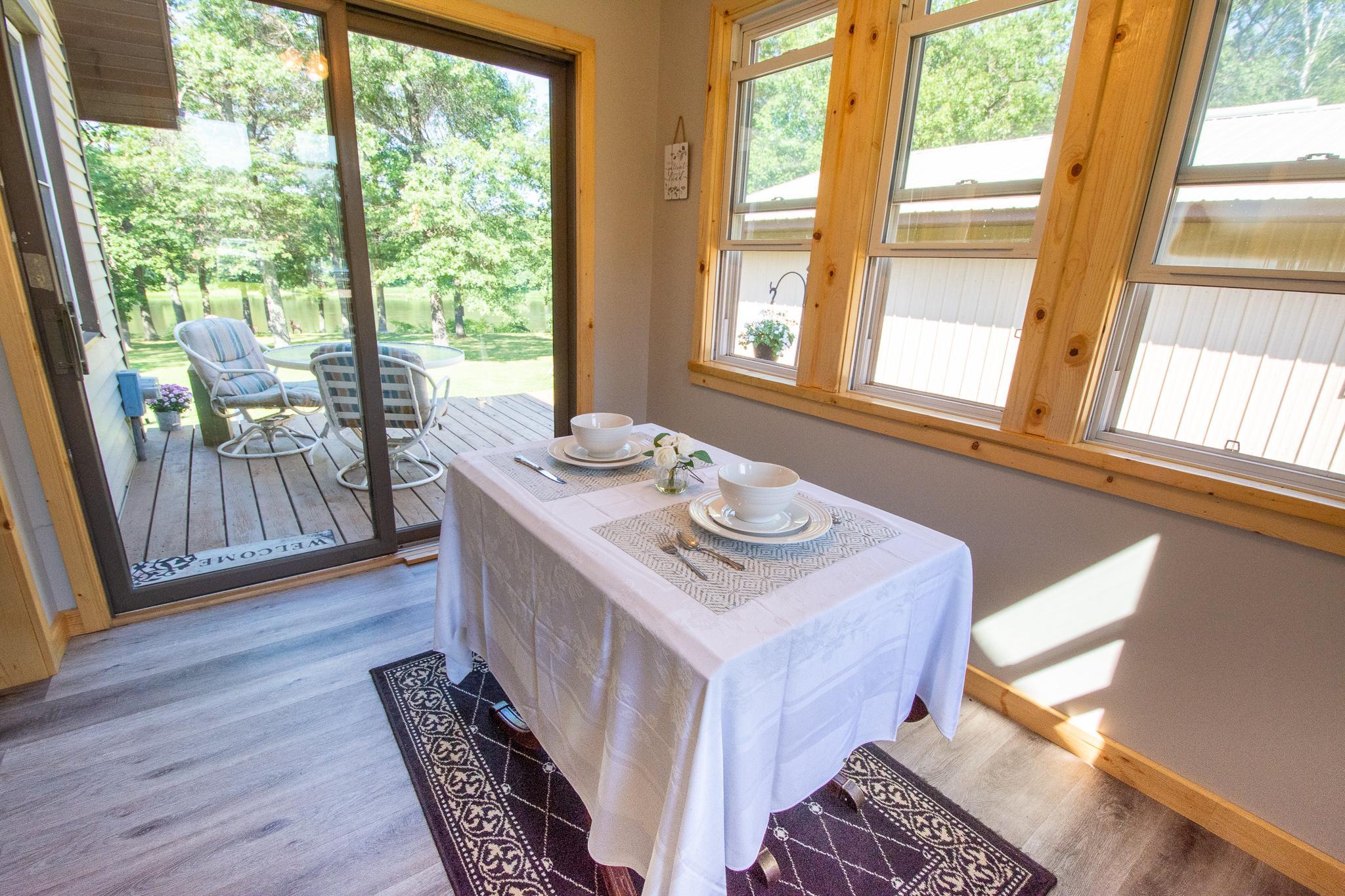 Sunroom/ Breakfast nook leads out to the patio, here you will find amazing river views and wildlife abounds!