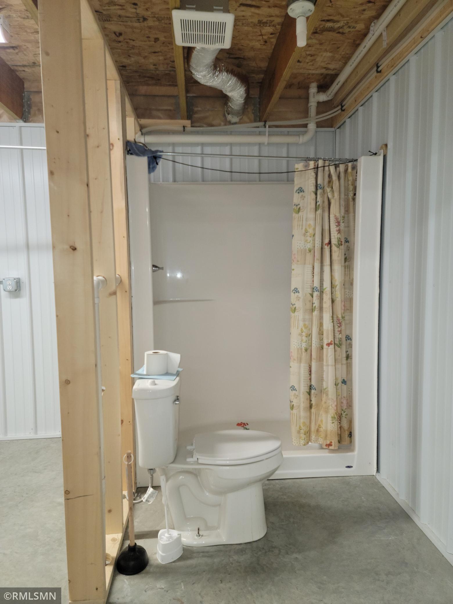 1/2 Bath in shop, Stool and walk in Shower