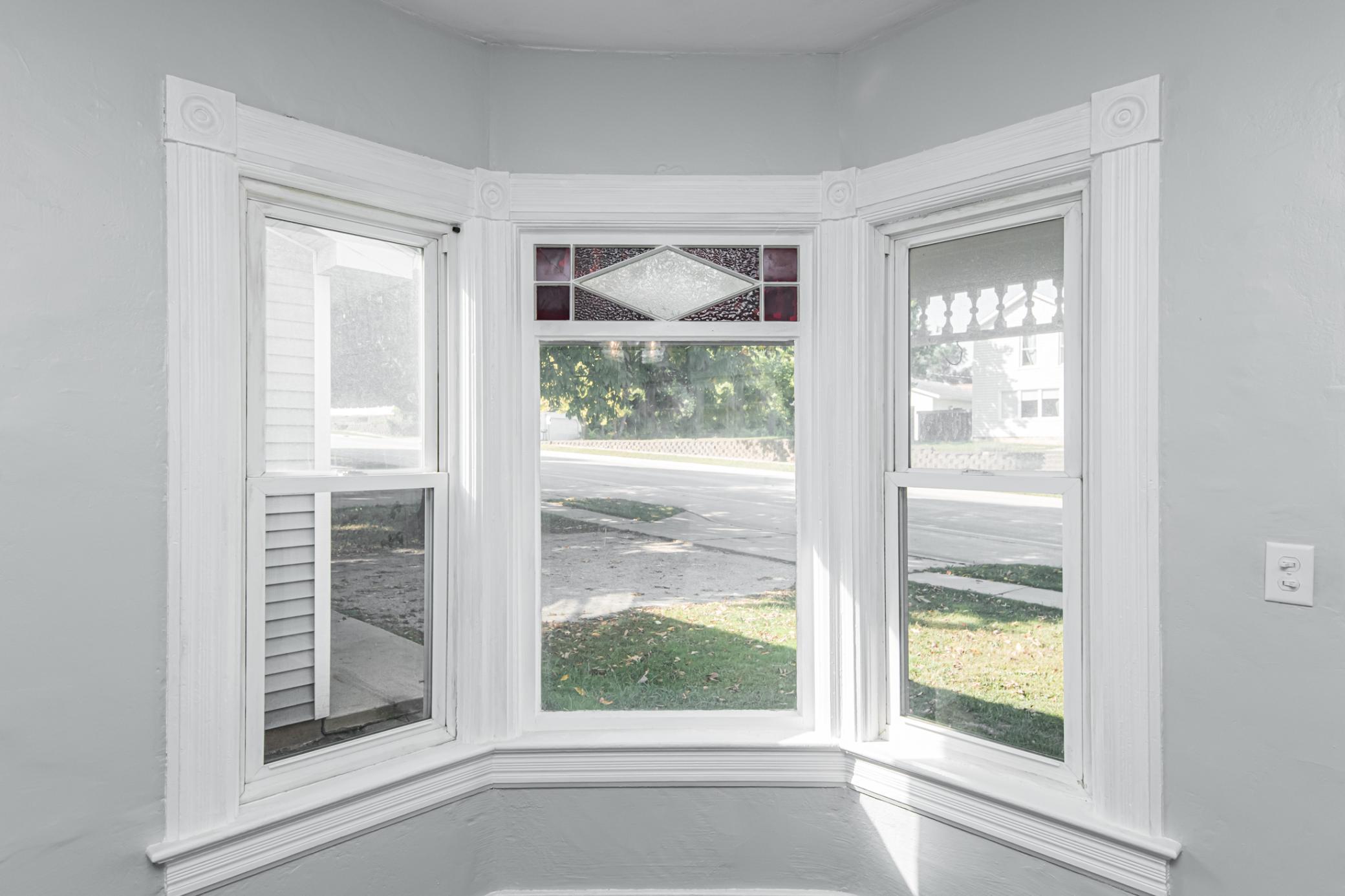 Photo for 305 S Section Avenue, Spring Valley, MN 55975 - Listing #6435441 Newer side windows and original stained glass