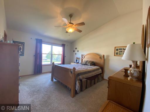 SPACIOUS MASTER BEDROOM WITH VAULTED CEILING, CEILING FAN AND LIGHT