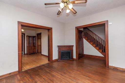 Hardwood flooring and original woodwork plus a pocket door between the living and dining room!