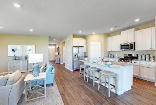 Enjoy entertaining in your new home with fabulous designer selections and finishes. Model photo. Options and colors will vary.