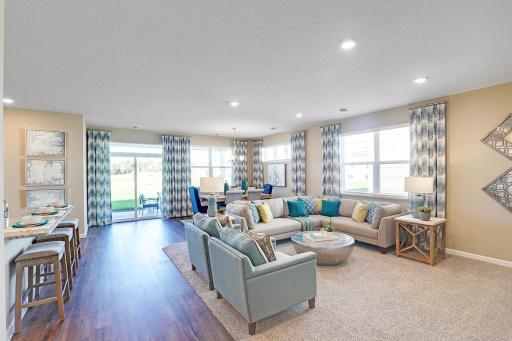 Open concept design perfect for entertaining and living. Model photos. Options and colors will vary.