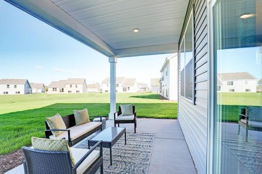 Enjoy a covered patio for entertaining and relaxing! Model photo.