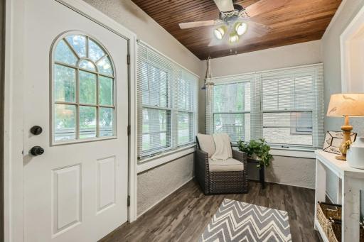 Enter through the heated front porch with beadboard ceiling