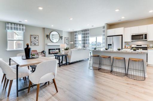 Welcome to the Elder! The home's dining area is large enough to fit just about any table and seating arrangement - and resides perfectly within a main level that just makes sense throughout!! (Photo of model, colors may vary)