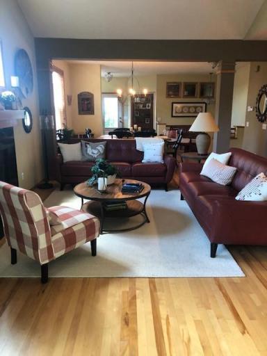 Living room is the hub between dining room, kitchen and sun room.