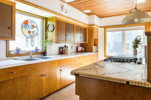 Kitchen offers lots of light and mid-century vibes!