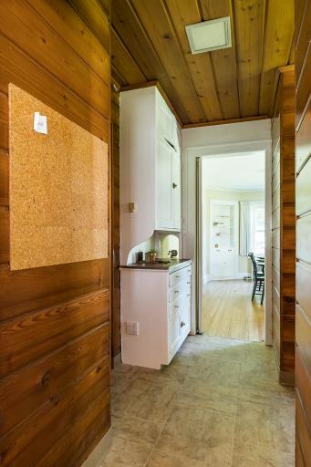 Consider this useful pantry space or perhaps mudroom space between the kitchen and dining rooms - side door and powder room are to the right