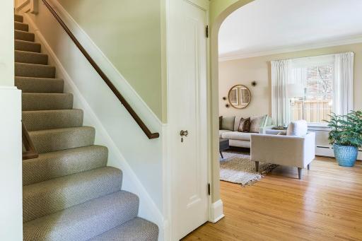 Stairway is between the formal dining and formal living rooms (and front coat closet pictured here)