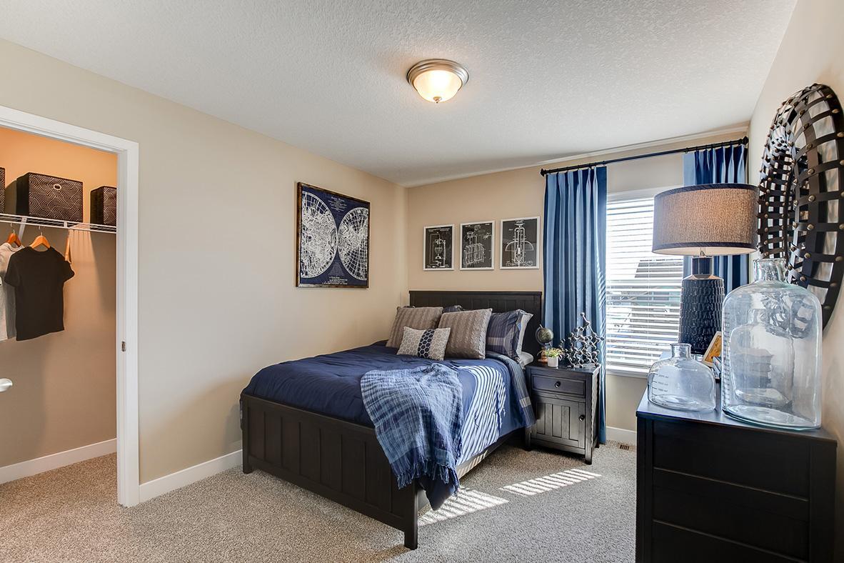 Space is also abundant throughout the rest of the home's upper level bedrooms. Model home photo, colors and selections may vary.