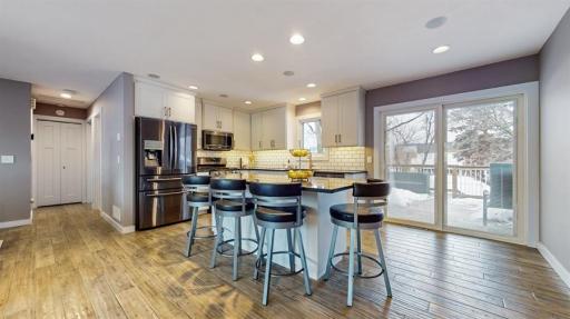 Kitchen island is ideal for entertaining, snacking and meal prep.