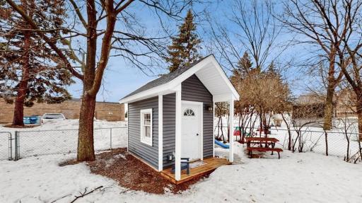Mature trees and a nice backyard for outdoor fun, including a fully finished playhouse with power and ethernet.