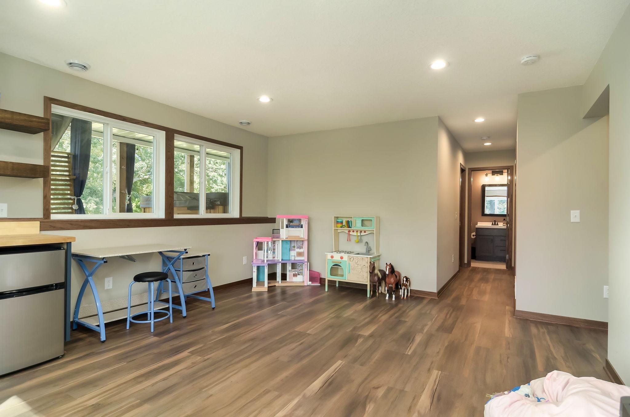 Inviting and just darn cute, the family room is a great play room or hangout space.