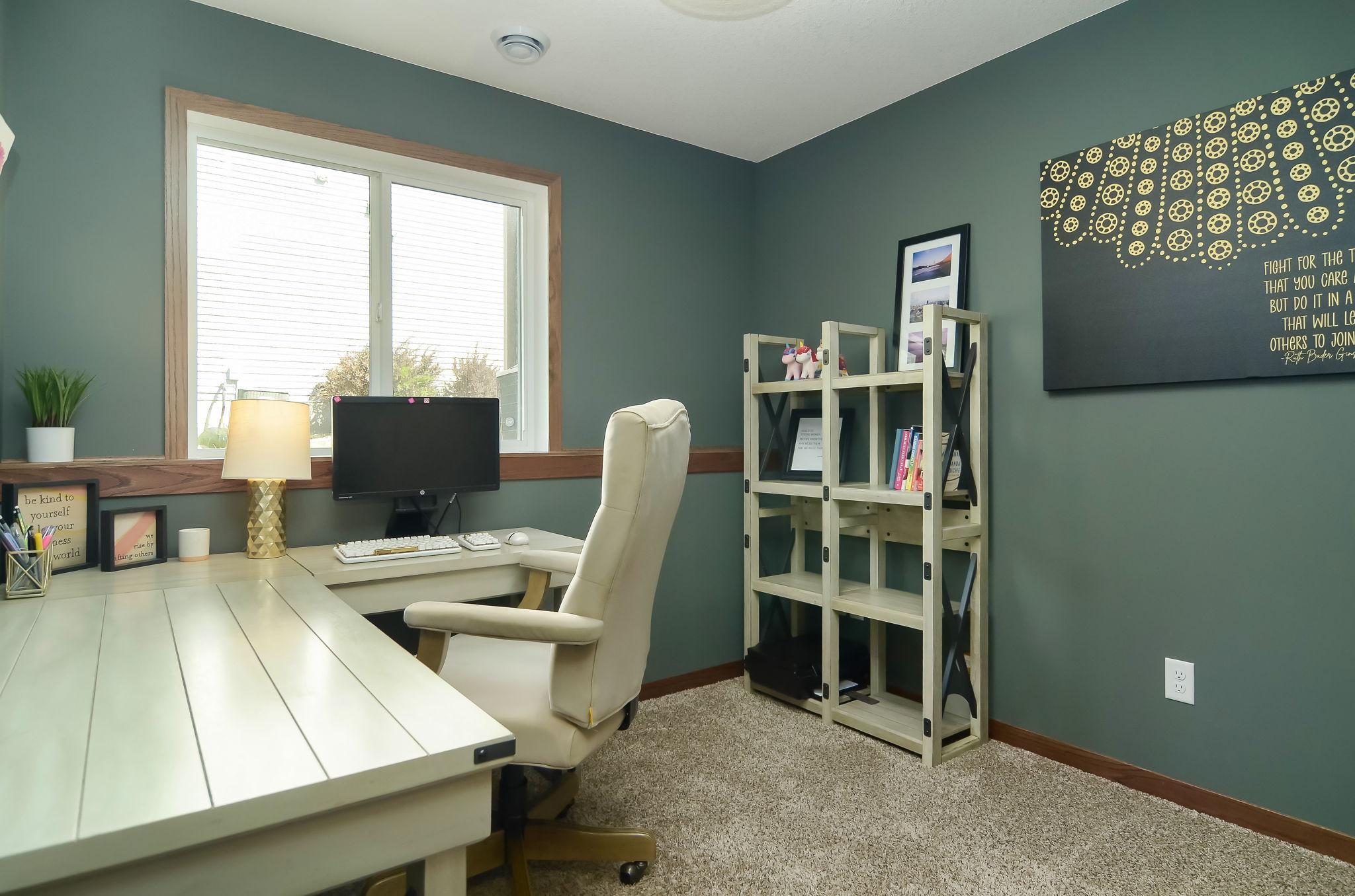 Lower fifth bedroom is the perfect work from home space.