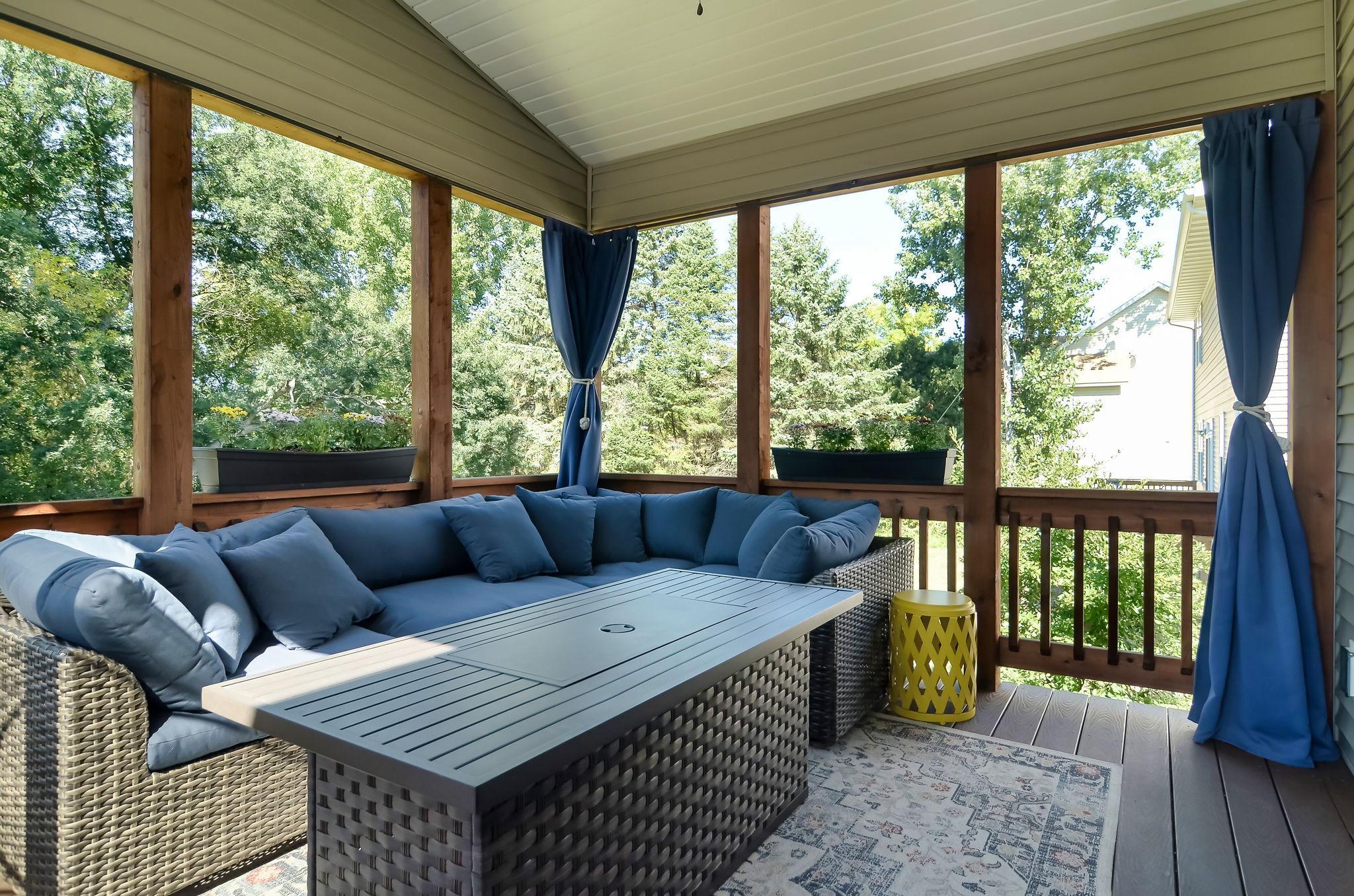 Cozy in heat or rain, the covered deck is the outdoor living room of your dreams