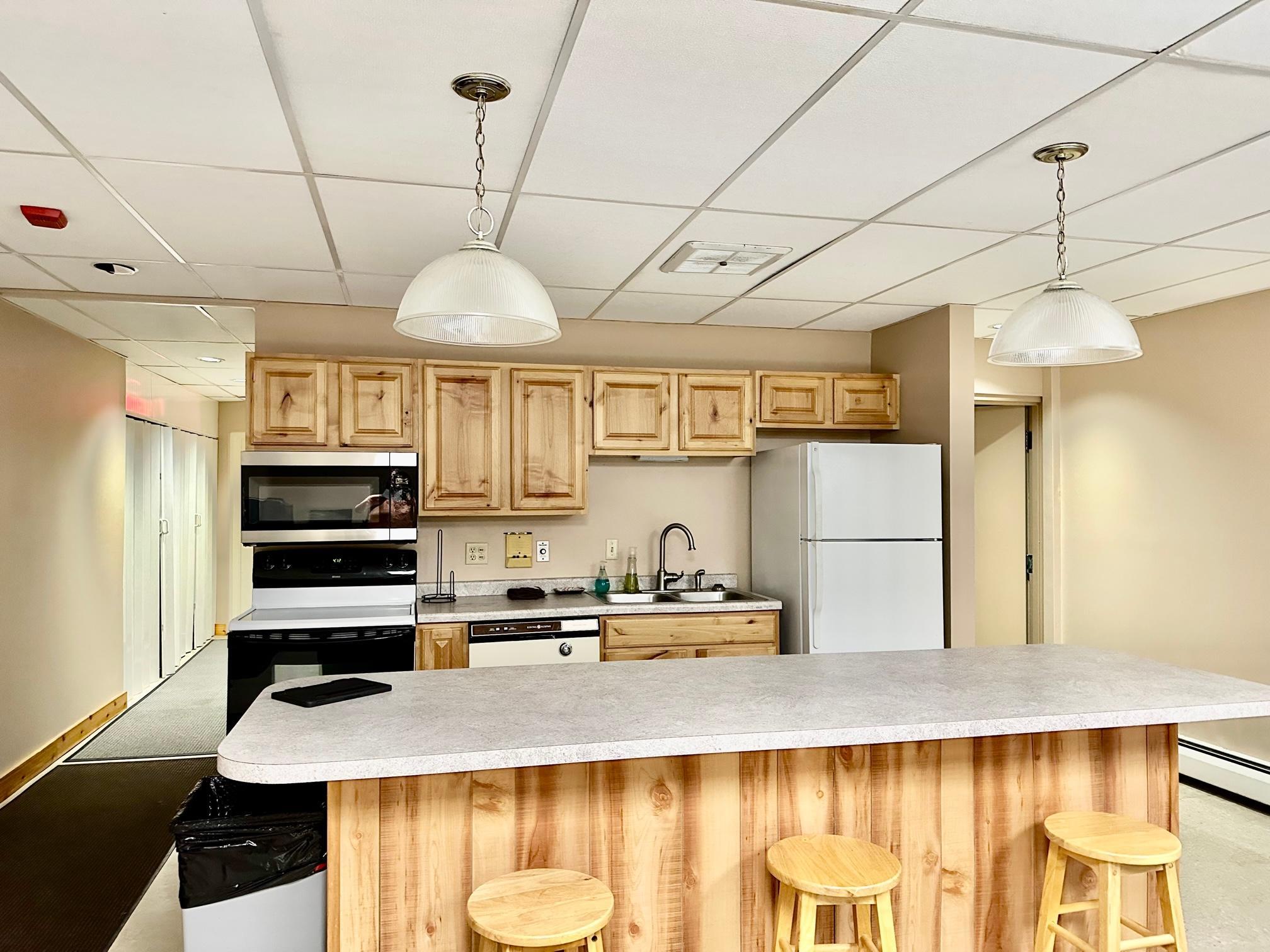 Kitchen area in spacious party room available for residents