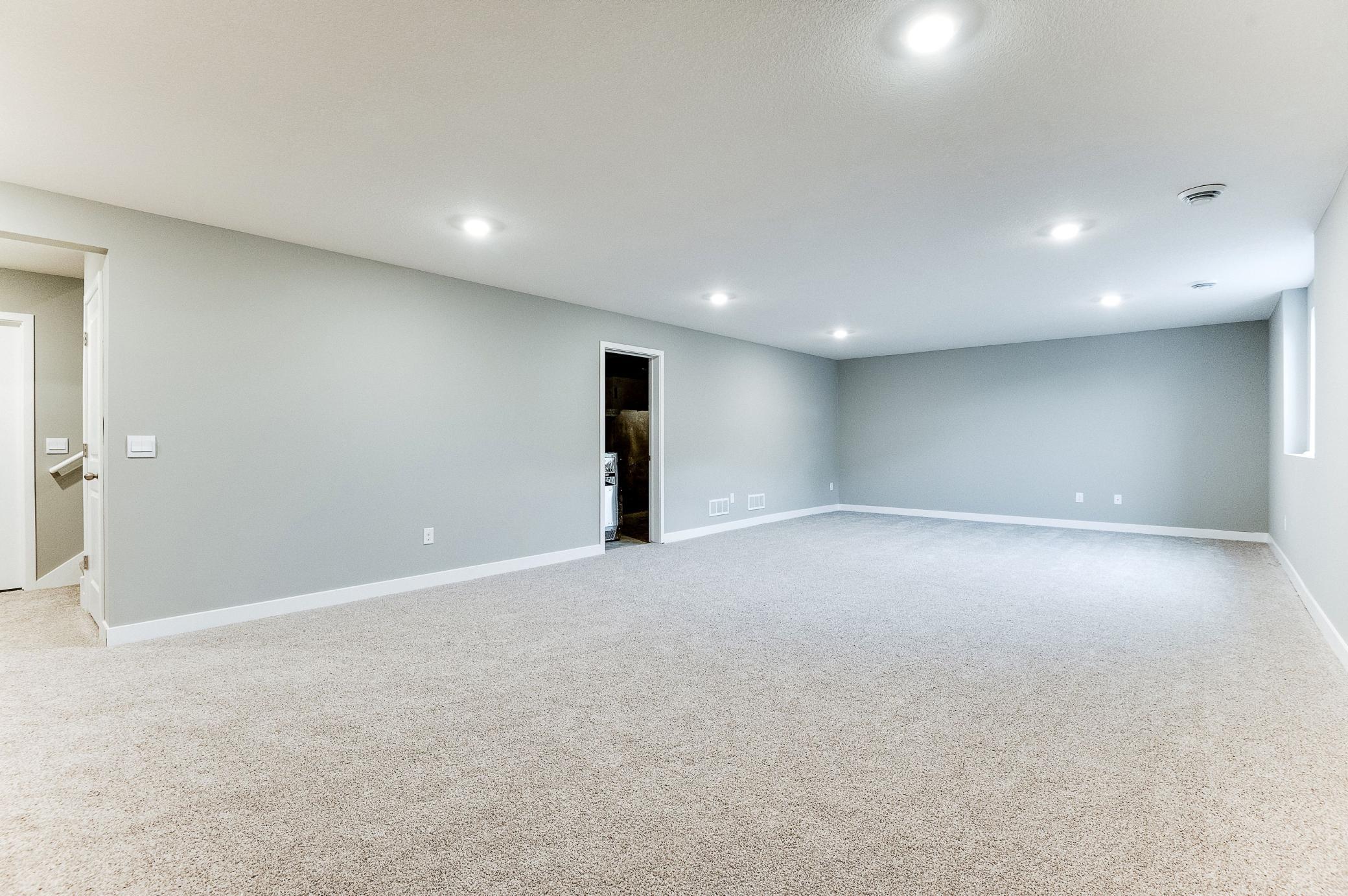 In addition to finished space, oversized mechanical room can be utilized for storage. Photo of model home, color and options will vary.