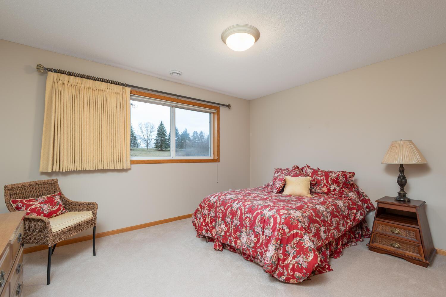 Both bedrooms have oversize windows looking out to mature trees and the wetland.