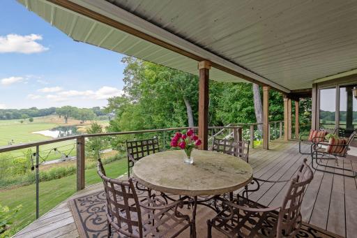 This level has a fantastic covered deck with stairs to the backyard..