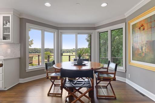 The informal dining space, with bay window views, is ideal for any meal.