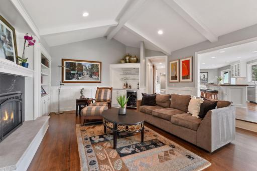 The beams add a beautiful architectural touch to the family room's design.