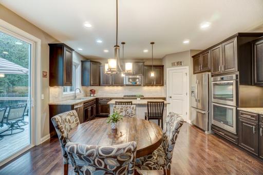 Beautiful kitchen with SS appliances, island, pantry, and plenty of storage space