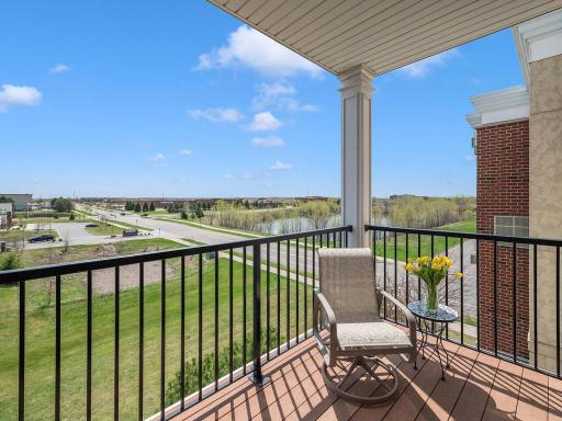 Enjoy the sunshine, view of the water, and your morning coffee on maintenance-free balcony