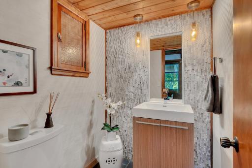 Upstairs, updated half bath - conveniently located just off the mud room and dining room...