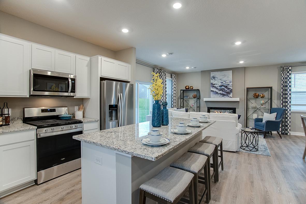 Great kitchen with stunning granite counters and stainless appliances. Just Imagine entertaining in your new kitchen.