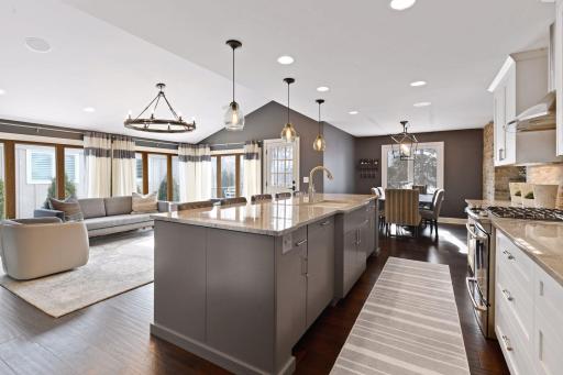 A seamless transition from kitchen to dining to relaxation.
