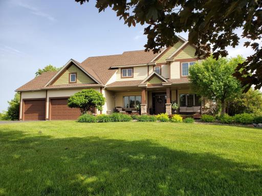 This distinguished 6-bedroom LifeStyle home sits on approx. 2 acres in the sought-after Scenic Hills neighborhood of Hudson, WI.