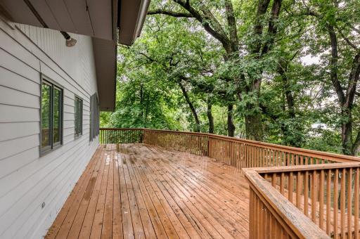 Deck overlooking PLEASANT LAKE, with access from the main floor Family Room.