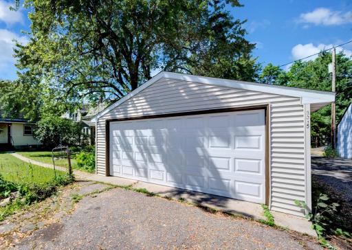 This is a nice two-car garage, with shelving in place. It's just off the alley, so easy to park!
