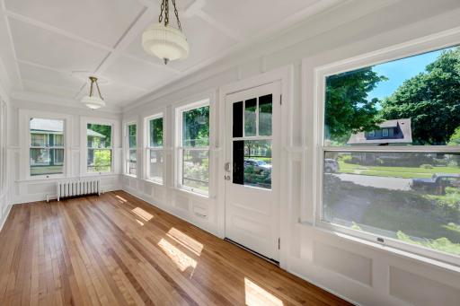 The sunroom was probably once a porch, but was long ago converted to full four season use, with radiators at both end. What a fabulous place to spend a cold winter day! West facing, so great sunset views.