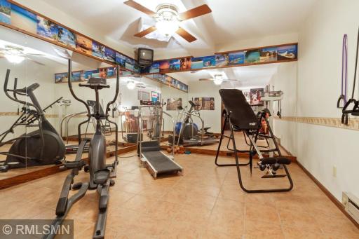 Exercise area lower level - could be game/billiard room