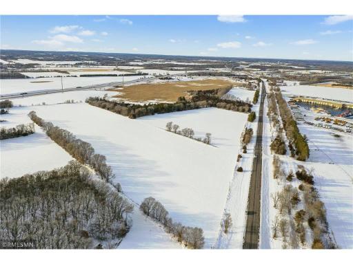 95 acres snow county Road 75 on right side of photo